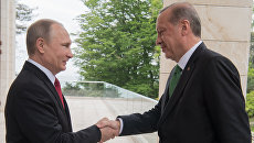 Президент РФ Владимир Путин и президент Турции Реджеп Тайип Эрдоган во время встречи. 3 мая 2017 Президент РФ Владимир Путин и президент Турции Реджеп Тайип Эрдоган во время встречи. 3 мая 2017