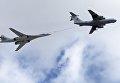 Самолет-заправщик Ил-78 (справа) и сверхзвуковой стратегический бомбардировщик-ракетоносец Ту-160 Владимир Судец на репетиции воздушной части парада Победы в Москве Самолет-заправщик Ил-78 (справа) и сверхзвуковой стратегический бомбардировщик-ракетоносец Ту-160 Владимир Судец на репетиции воздушной части парада Победы в Москве