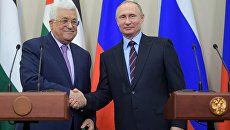 Президент РФ Владимир Путин и президент Палестины Махмуд Аббас во время встречи в Сочи Президент РФ Владимир Путин и президент Палестины Махмуд Аббас во время встречи в Сочи