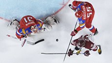 Вратарь сборной России Илья Сорокин, игрок сборной России Богдан Киселевич и игрок сборной Латвии Роберт Букартс (слева направо) в матче группового этапа чемпионата мира по хоккею 2017 между сборными командами России и Латвии Вратарь сборной России Илья Сорокин, игрок сборной России Богдан Киселевич и игрок сборной Латвии Роберт Букартс (слева направо) в матче группового этапа чемпионата мира по хоккею 2017 между сборными командами России и Латвии
