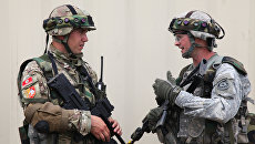 Военнослужащие Черногории и США во время совместных учений. Архивное фото Военнослужащие Черногории и США во время совместных учений. Архивное фото