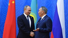 Президент РФ Владимир Путин и президент Казахстана Нурсултан Назарбаев. Архивное фото Президент РФ Владимир Путин и президент Казахстана Нурсултан Назарбаев. Архивное фото