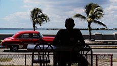 Набережная кубинского города. Архивное фото Набережная кубинского города. Архивное фото