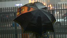 Дождь в Москве. Архивное фото Дождь в Москве. Архивное фото