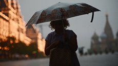 Дождь в Москве. Архивное фото Дождь в Москве. Архивное фото