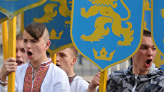 Участники марша в честь годовщины создания дивизии СС Галичина во Львове Участники марша в честь годовщины создания дивизии СС Галичина во Львове