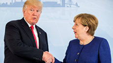 Президент США Дональд Трамп во время встречи с канцлером Германии Ангелой Меркель накануне саммита G20 в Гамбурге Президент США Дональд Трамп во время встречи с канцлером Германии Ангелой Меркель накануне саммита G20 в Гамбурге