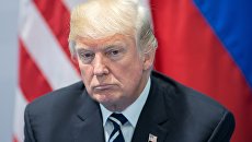 Президент США Дональд Трам во время беседы с президентом РФ Владимиром Путиным на полях саммита лидеров Группы двадцати G20 в Гамбурге. 7 июля 2017 Президент США Дональд Трам во время беседы с президентом РФ Владимиром Путиным на полях саммита лидеров Группы двадцати G20 в Гамбурге. 7 июля 2017