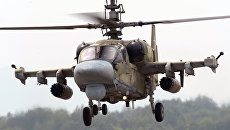 Вертолет Ка-52 Аллигатор во время учений. Архивное фото Вертолет Ка-52 Аллигатор во время учений. Архивное фото