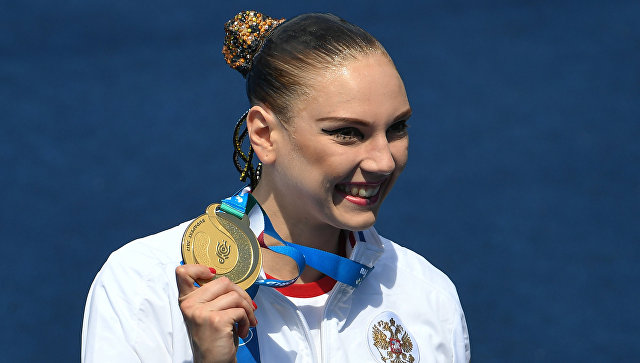 Светлана Колесниченко (Россия), завоевавшая золотую медаль в соревнованиях по синхронному плаванию в произвольной программе среди солисток. 19 июля 2017