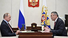 Президент РФ Владимир Путин и глава Калмыкии Алексей Орлов. 31 июля 2017 Президент РФ Владимир Путин и глава Калмыкии Алексей Орлов. 31 июля 2017