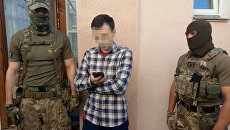 Задержание журналиста Василия Муравицкого сотрудниками СБУ. Архивное фото Задержание журналиста Василия Муравицкого сотрудниками СБУ. Архивное фото