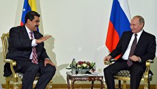 Президент РФ Владимир Путин и президент Венесуэлы Николас Мадуро. Архивное фото Президент РФ Владимир Путин и президент Венесуэлы Николас Мадуро. Архивное фото