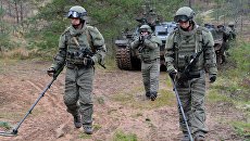 Военнослужащие саперного подразделения вооруженных сил РФ. Архивное фото Военнослужащие саперного подразделения вооруженных сил РФ. Архивное фото