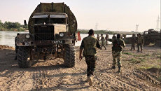 Бойцы сирийской армии во время подготовки к форсированию реки Ефрат в районе города Дейр-эз-Зор. Архивное фото Бойцы сирийской армии во время подготовки к форсированию реки Ефрат в районе города Дейр-эз-Зор. Архивное фото