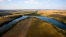 Вид на поля Краснодарского края. Архивное фото Вид на поля Краснодарского края. Архивное фото