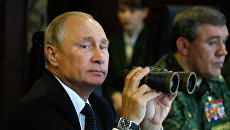 Владимир Путин во время инспекции учений Запад-2017. 18 сентября 2017 Владимир Путин во время инспекции учений Запад-2017. 18 сентября 2017