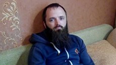 Задержанный лидер Христианского государства Александр Калинин. Архивное фото. Задержанный лидер Христианского государства Александр Калинин. Архивное фото.