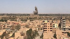 Вид на район Джафра в Дейр-эз-Зоре, где продолжаются бои между сирийской армией и боевиками запрещенной в России организации ИГИЛ. 23 сентября 2017 Вид на район Джафра в Дейр-эз-Зоре, где продолжаются бои между сирийской армией и боевиками запрещенной в России организации ИГИЛ. 23 сентября 2017
