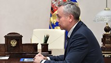 Андрей Травников во время встречи с президентом РФ Владимиром Путиным. 6 октября 2017 Андрей Травников во время встречи с президентом РФ Владимиром Путиным. 6 октября 2017