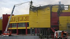 Последствия пожара на строительном рынке Синдика, расположенном у МКАД в районе Строгино. 9 октября 2017 Последствия пожара на строительном рынке Синдика, расположенном у МКАД в районе Строгино. 9 октября 2017