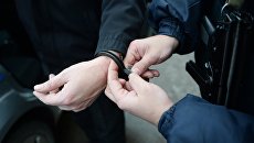 Задержание правонарушителя. Архивное фото Задержание правонарушителя. Архивное фото