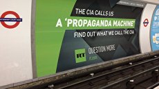 Рекламный плакат RT в лондонском метро. Архивное фото Рекламный плакат RT в лондонском метро. Архивное фото