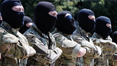 Бойцы добровольческого батальона принимают присягу на верность Украине в Киеве Бойцы добровольческого батальона принимают присягу на верность Украине в Киеве