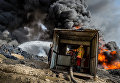 Alessandro Rota. Qayyarah burning oil fields Alessandro Rota. Qayyarah burning oil fields