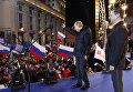 Президент России Дмитрий Медведев и премьер-министр РФ, кандидат в президенты Владимир Путин на митинге на Манежной площади в Москве. 2012 год Президент России Дмитрий Медведев и премьер-министр РФ, кандидат в президенты Владимир Путин на митинге на Манежной площади в Москве. 2012 год