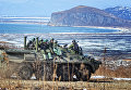 Морские пехотинцы десантно-штурмовой роты на учениях соединений морской пехоты Тихоокеанского флота Морские пехотинцы десантно-штурмовой роты на учениях соединений морской пехоты Тихоокеанского флота