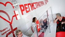 Регистратура в поликлинике. Архивное фото Регистратура в поликлинике. Архивное фото
