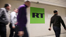 Сотрудники в офисе телеканала RT. Архивное фото Сотрудники в офисе телеканала RT. Архивное фото