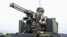 Военнослужащий армии США во время совместных учений войск НАТО. Архивное фото Военнослужащий армии США во время совместных учений войск НАТО. Архивное фото
