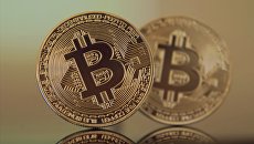 Криптовалюта биткоин. Архивное фото Криптовалюта биткоин. Архивное фото