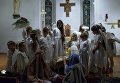 Прихожане во время празднования Рождества в храме Покрова Пресвятой Богородицы Царицы Святого Розария в Томске Прихожане во время празднования Рождества в храме Покрова Пресвятой Богородицы Царицы Святого Розария в Томске
