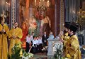 Председатель правительства России Дмитрий Медведев с супругой Светланой на праздничном Рождественском богослужении в храме Христа Спасителя Председатель правительства России Дмитрий Медведев с супругой Светланой на праздничном Рождественском богослужении в храме Христа Спасителя