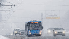 Автотранспорт на Ленинском проспекте во время снегопада в Москве. Февраль 2018 Автотранспорт на Ленинском проспекте во время снегопада в Москве. Февраль 2018