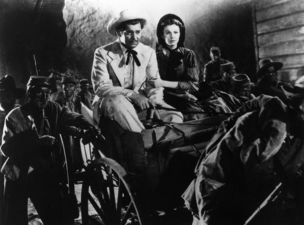 Вивьен Ли и Кларк Гейбл в фильме Унесенные ветром. 1939 Вивьен Ли и Кларк Гейбл в фильме Унесенные ветром. 1939