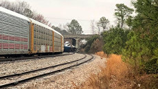 На месте столкновения пассажирского поезда компании Amtrak с грузовым железнодорожным составом в штате Южная Каролина, США. 4 февраля 2018 На месте столкновения пассажирского поезда компании Amtrak с грузовым железнодорожным составом в штате Южная Каролина, США. 4 февраля 2018