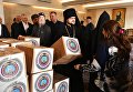 Глава российской делегации межрелигиозной рабочей группы Совета по взаимодействию с религиозными объединениями при президенте РФ иеромонах Стефан (Игумнов) во время раздачи гуманитарной помощи для сирийских беженцев в греко-католической церкви в ливанском городе Захия Глава российской делегации межрелигиозной рабочей группы Совета по взаимодействию с религиозными объединениями при президенте РФ иеромонах Стефан (Игумнов) во время раздачи гуманитарной помощи для сирийских беженцев в греко-католической церкви в ливанском городе Захия