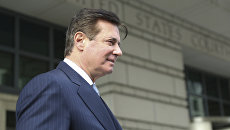 Экс-глава предвыборного штаба Трампа Пол Манафорт у здания федерального суда в Вашингтоне. 14 февраля 2018 Экс-глава предвыборного штаба Трампа Пол Манафорт у здания федерального суда в Вашингтоне. 14 февраля 2018