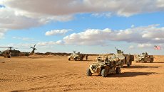 Американские военнослужащие в районе населенного пункта Эт-Танф, Сирия. Архивное фото Американские военнослужащие в районе населенного пункта Эт-Танф, Сирия. Архивное фото