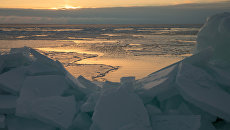 Рассвет на побережье Охотского моря. Архивное фото Рассвет на побережье Охотского моря. Архивное фото
