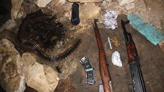 Оружие и боеприпасы изъятые из схрона в ходе проведения операции в КЧР. 10 марта 2018 Оружие и боеприпасы изъятые из схрона в ходе проведения операции в КЧР. 10 марта 2018