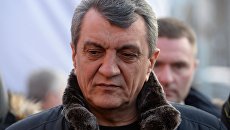 Полномочный представитель президента РФ в Сибирском федеральном округе Сергей Меняйло у здания ТЦ Зимняя вишня в Кемерово, где произошел пожар. 26 марта 2018 Полномочный представитель президента РФ в Сибирском федеральном округе Сергей Меняйло у здания ТЦ Зимняя вишня в Кемерово, где произошел пожар. 26 марта 2018