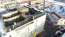 Здание торгового центра Зимняя вишня в Кемерово, где произошел пожар. 26 марта 2018 Здание торгового центра Зимняя вишня в Кемерово, где произошел пожар. 26 марта 2018