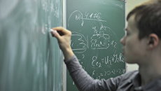 Ученик у доски на уроке физики Ученик у доски на уроке физики