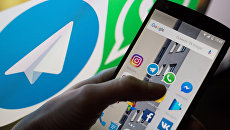 Логотип мессенджера Telegram. Архивное фото Логотип мессенджера Telegram. Архивное фото