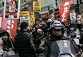 Участники акции протеста против ударов по Сирии в Нью-Йорке Участники акции протеста против ударов по Сирии в Нью-Йорке